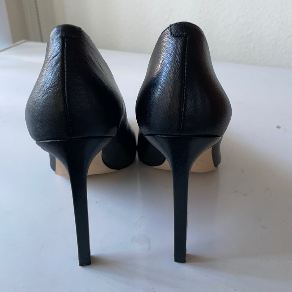 Nine West Black very high heel pumps.